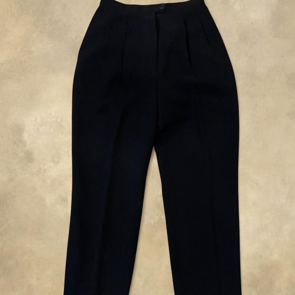 Black high-waisted pleated trousers
